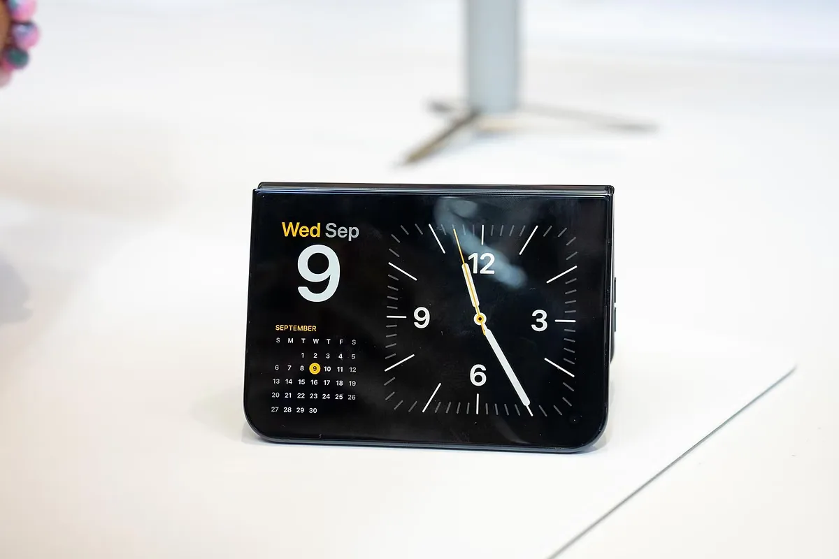 A photo of the iPhone Duo, unfolded and sitting on a table in a tent shape.